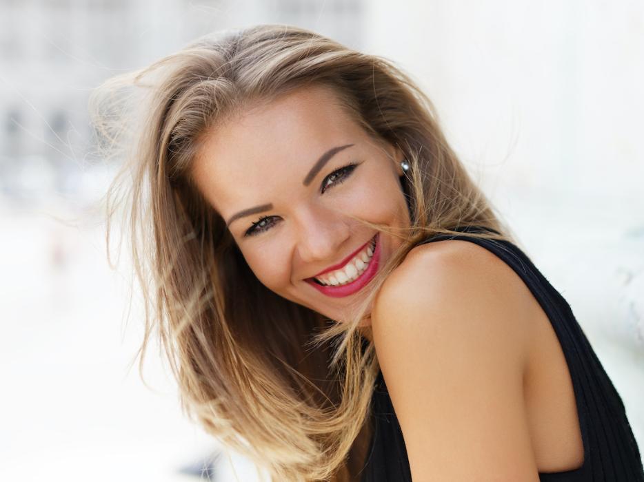 woman smiling after cosmetic dentistry in brisbane