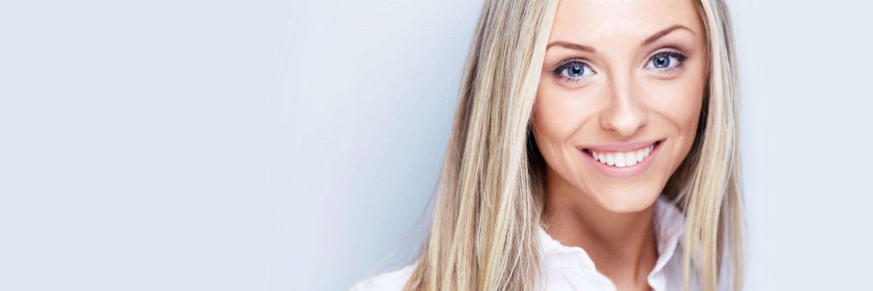 Woman smiling at general dentist in Brisbane CBD