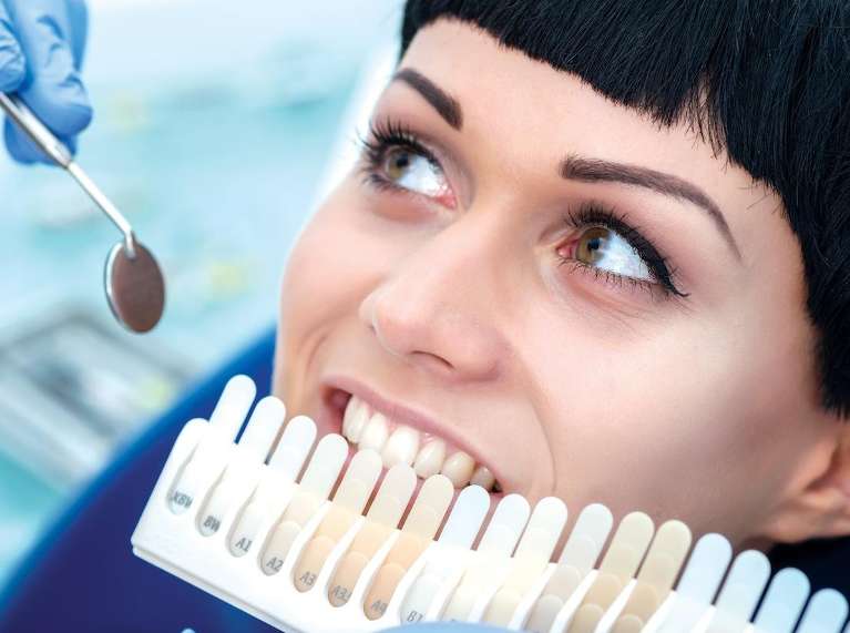 woman getting professional teeth whitening in brisbane
