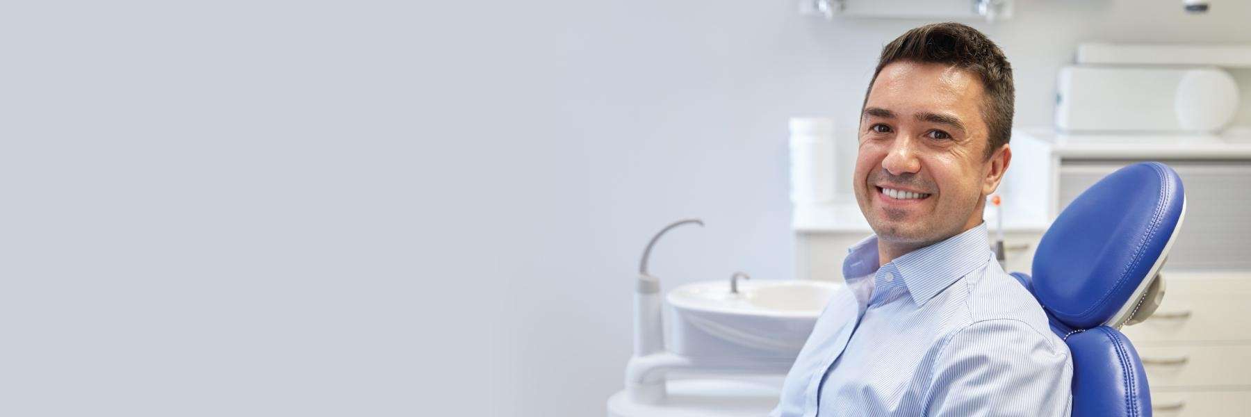 man smiling in brisbane dental clinic