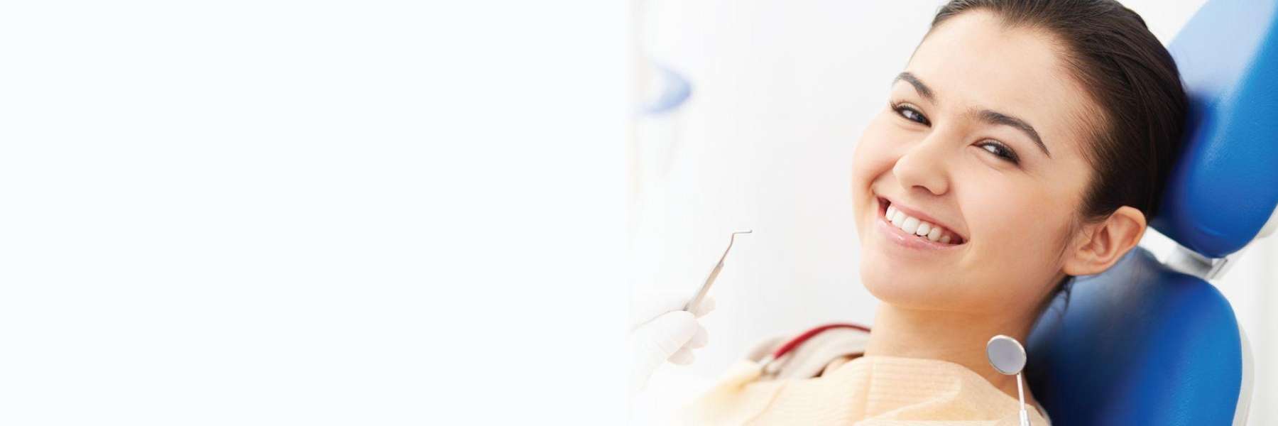 brisbane woman smiling after getting dental exam